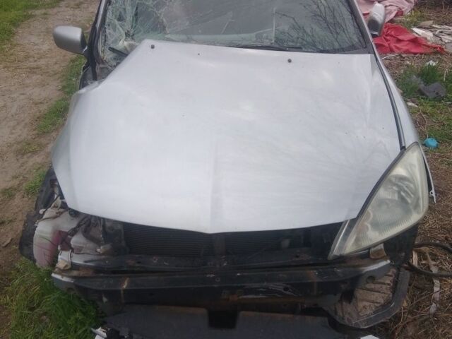 Синій Міцубісі Lancer, об'ємом двигуна 1.6 л та пробігом 100 тис. км за 842 $, фото 1 на Automoto.ua