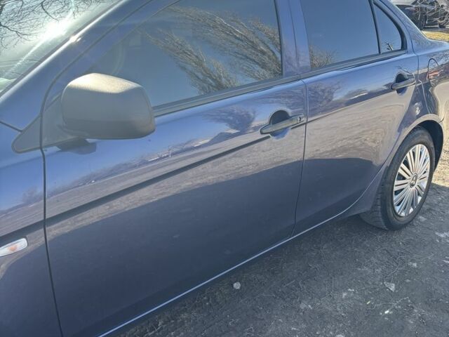 Синий Мицубиси Лансер, объемом двигателя 1.5 л и пробегом 193 тыс. км за 5000 $, фото 1 на Automoto.ua