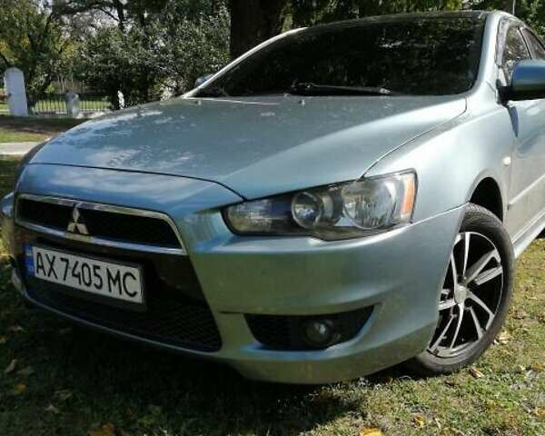 Синій Міцубісі Lancer, об'ємом двигуна 2 л та пробігом 285 тис. км за 5500 $, фото 1 на Automoto.ua