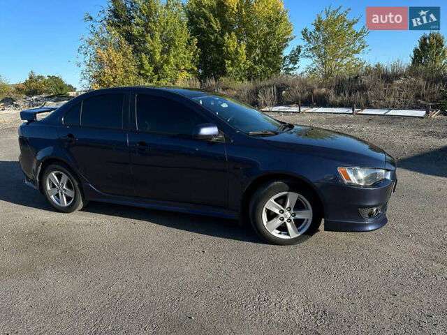 Синій Міцубісі Lancer, об'ємом двигуна 2 л та пробігом 240 тис. км за 6800 $, фото 1 на Automoto.ua