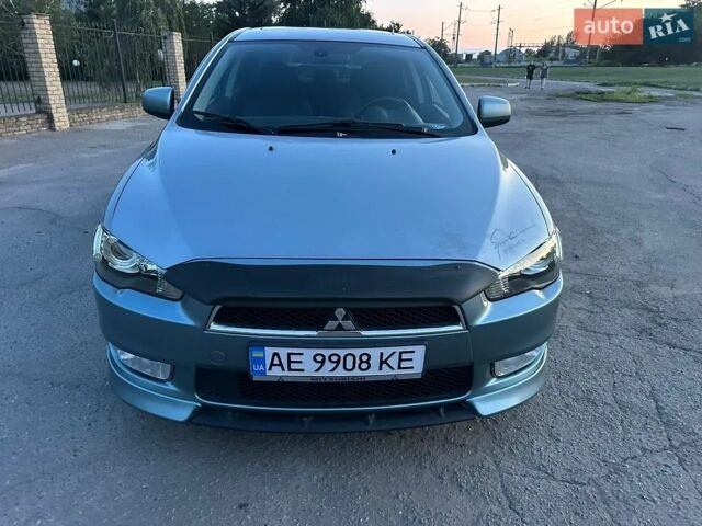 Синий Мицубиси Лансер, объемом двигателя 2 л и пробегом 210 тыс. км за 6005 $, фото 1 на Automoto.ua