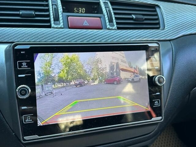 Синий Мицубиси Лансер, объемом двигателя 1.6 л и пробегом 305 тыс. км за 4200 $, фото 1 на Automoto.ua