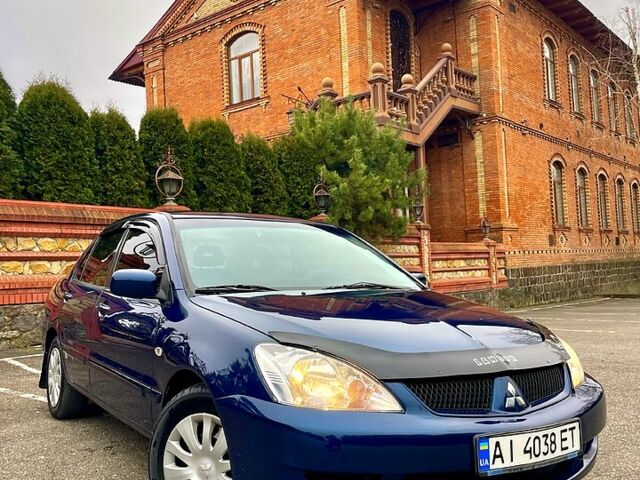 Синій Міцубісі Lancer, об'ємом двигуна 1.6 л та пробігом 183 тис. км за 4950 $, фото 1 на Automoto.ua
