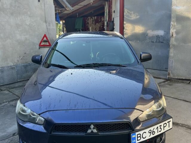 Синій Міцубісі Lancer, об'ємом двигуна 2 л та пробігом 186 тис. км за 6011 $, фото 1 на Automoto.ua