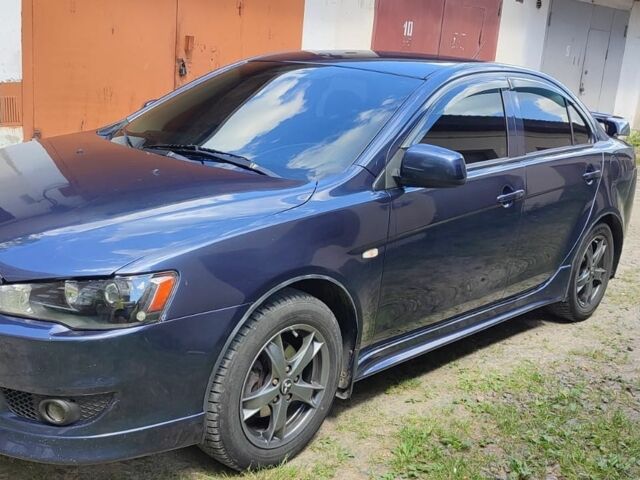Синій Міцубісі Lancer, об'ємом двигуна 2 л та пробігом 200 тис. км за 6500 $, фото 1 на Automoto.ua