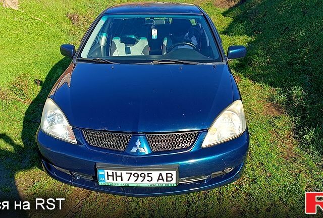 Синій Міцубісі Lancer, об'ємом двигуна 1.6 л та пробігом 285 тис. км за 3700 $, фото 1 на Automoto.ua