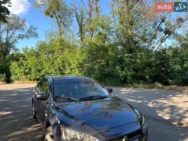 Синій Міцубісі Lancer, об'ємом двигуна 2 л та пробігом 314 тис. км за 5400 $, фото 1 на Automoto.ua