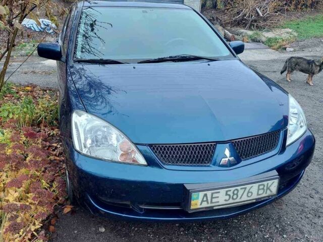 Синий Мицубиси Лансер, объемом двигателя 1.6 л и пробегом 87 тыс. км за 7000 $, фото 1 на Automoto.ua