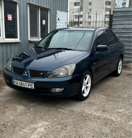 Синій Міцубісі Lancer, об'ємом двигуна 2 л та пробігом 222 тис. км за 3999 $, фото 1 на Automoto.ua