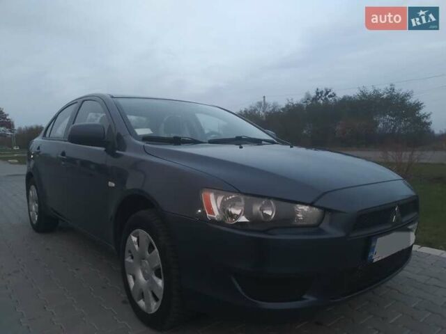 Синий Мицубиси Лансер, объемом двигателя 1.5 л и пробегом 260 тыс. км за 5000 $, фото 1 на Automoto.ua