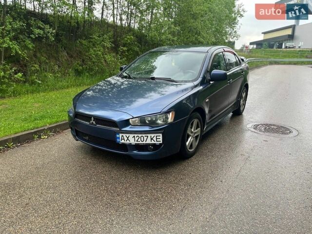 Синій Міцубісі Lancer, об'ємом двигуна 2 л та пробігом 310 тис. км за 4800 $, фото 1 на Automoto.ua