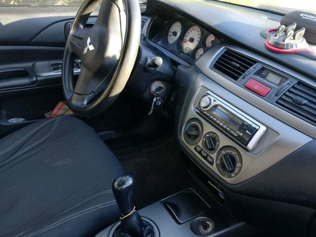 Синій Міцубісі Lancer, об'ємом двигуна 1.58 л та пробігом 317 тис. км за 3600 $, фото 1 на Automoto.ua