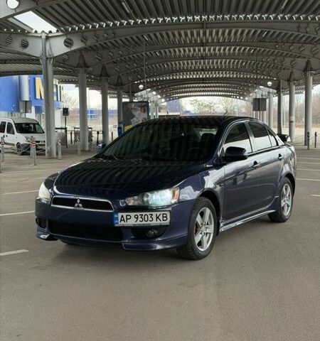 Синий Мицубиси Лансер, объемом двигателя 2 л и пробегом 255 тыс. км за 5999 $, фото 1 на Automoto.ua
