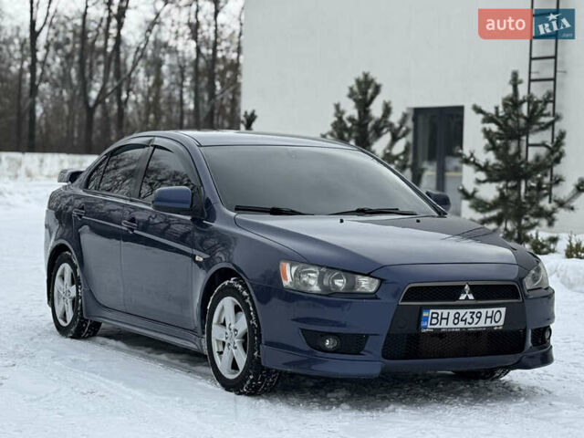 Синій Міцубісі Lancer, об'ємом двигуна 2 л та пробігом 220 тис. км за 7000 $, фото 1 на Automoto.ua
