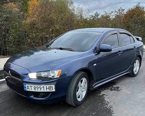 Синій Міцубісі Lancer, об'ємом двигуна 2 л та пробігом 190 тис. км за 6700 $, фото 1 на Automoto.ua
