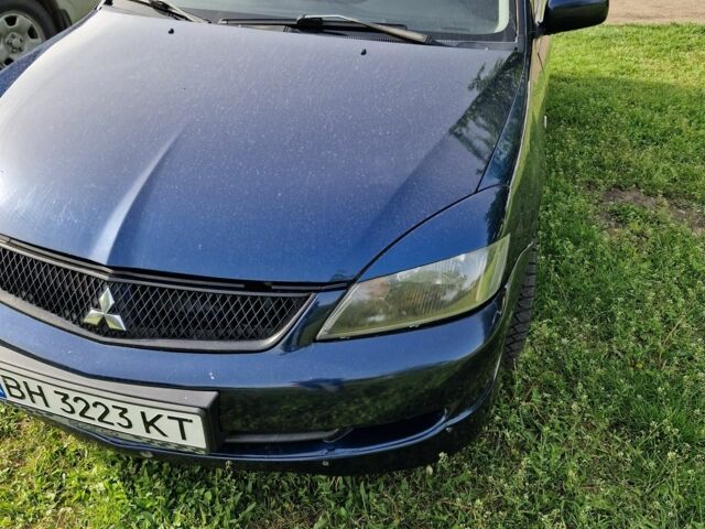 Синий Мицубиси Лансер, объемом двигателя 2 л и пробегом 260 тыс. км за 4200 $, фото 1 на Automoto.ua