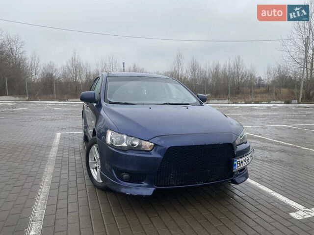 Синий Мицубиси Лансер, объемом двигателя 2 л и пробегом 193 тыс. км за 6800 $, фото 1 на Automoto.ua