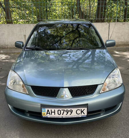 Синій Міцубісі Lancer, об'ємом двигуна 1.58 л та пробігом 210 тис. км за 5300 $, фото 1 на Automoto.ua