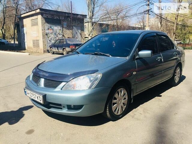 Синій Міцубісі Lancer, об'ємом двигуна 1.6 л та пробігом 192 тис. км за 6200 $, фото 1 на Automoto.ua