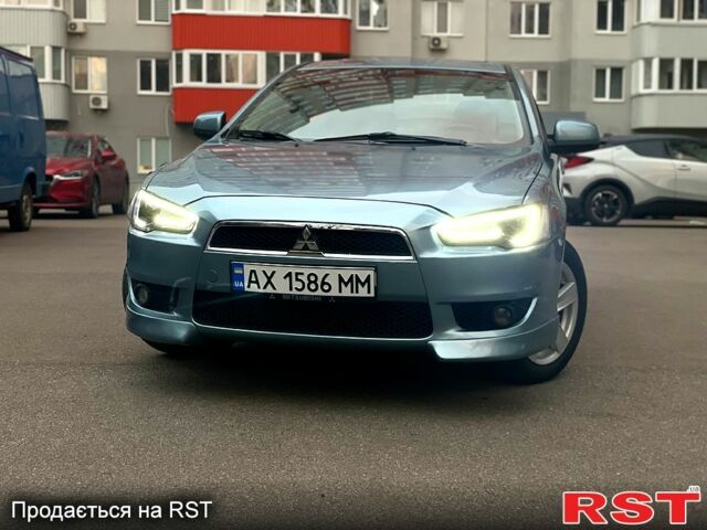 Синій Міцубісі Lancer, об'ємом двигуна 2 л та пробігом 193 тис. км за 6999 $, фото 1 на Automoto.ua