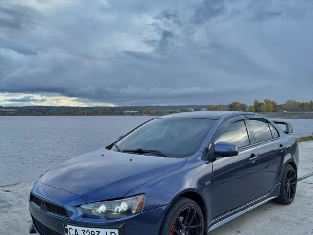 Синій Міцубісі Lancer, об'ємом двигуна 2 л та пробігом 238 тис. км за 6900 $, фото 1 на Automoto.ua