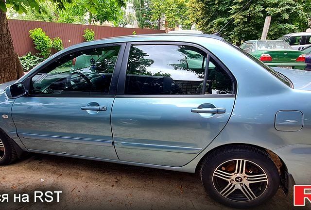 Синий Мицубиси Лансер, объемом двигателя 1.6 л и пробегом 215 тыс. км за 5200 $, фото 1 на Automoto.ua