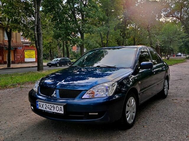 Синій Міцубісі Lancer, об'ємом двигуна 1.6 л та пробігом 225 тис. км за 4250 $, фото 1 на Automoto.ua