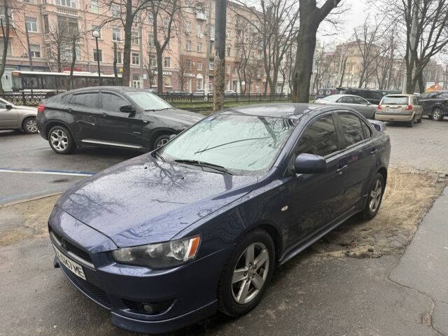 Синий Мицубиси Лансер, объемом двигателя 2 л и пробегом 200 тыс. км за 6700 $, фото 1 на Automoto.ua