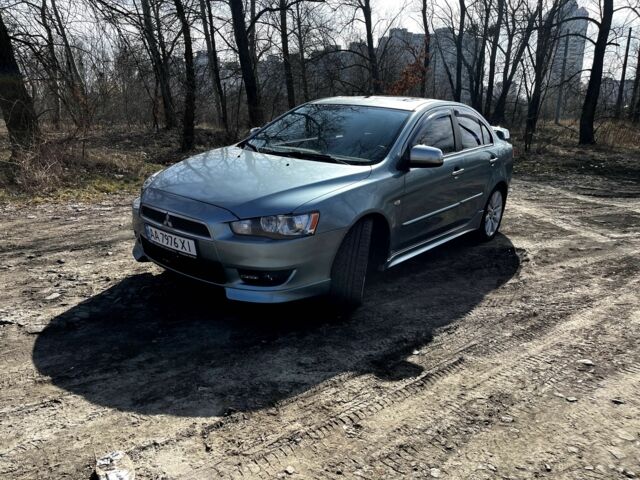 Синій Міцубісі Lancer, об'ємом двигуна 2 л та пробігом 112 тис. км за 8200 $, фото 1 на Automoto.ua