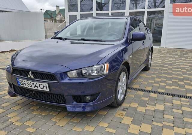 Синий Мицубиси Лансер, объемом двигателя 2 л и пробегом 186 тыс. км за 7200 $, фото 1 на Automoto.ua