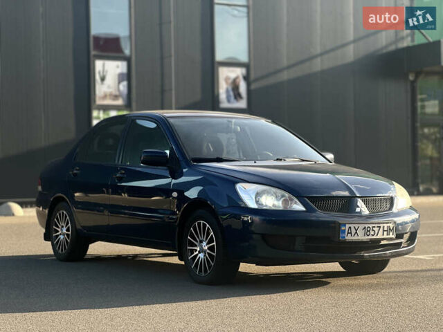 Синій Міцубісі Lancer, об'ємом двигуна 1.6 л та пробігом 191 тис. км за 3700 $, фото 1 на Automoto.ua