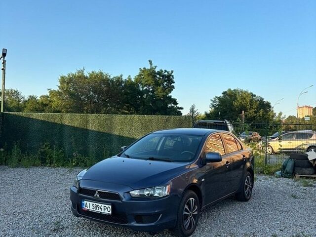 Синій Міцубісі Lancer, об'ємом двигуна 1.5 л та пробігом 260 тис. км за 4750 $, фото 1 на Automoto.ua