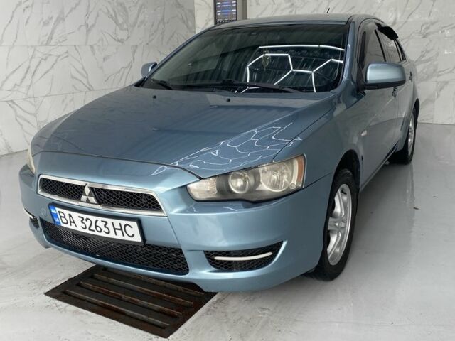 Синий Мицубиси Лансер, объемом двигателя 1.5 л и пробегом 261 тыс. км за 5500 $, фото 1 на Automoto.ua