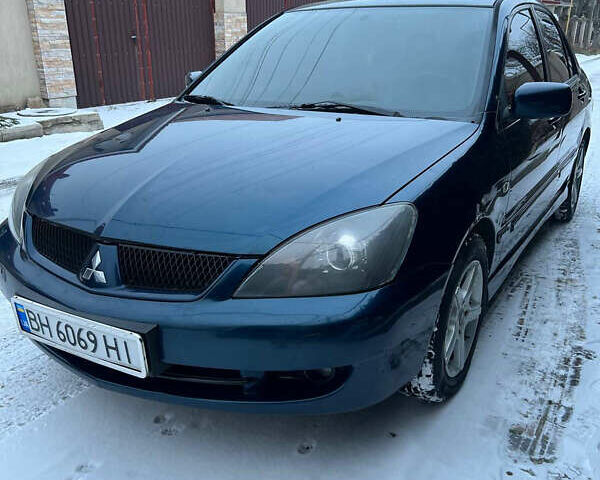 Синій Міцубісі Lancer, об'ємом двигуна 1.6 л та пробігом 209 тис. км за 3700 $, фото 1 на Automoto.ua