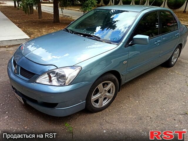Синій Міцубісі Lancer, об'ємом двигуна 1.6 л та пробігом 168 тис. км за 5500 $, фото 1 на Automoto.ua