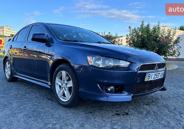 Синий Мицубиси Лансер, объемом двигателя 2 л и пробегом 250 тыс. км за 5800 $, фото 1 на Automoto.ua