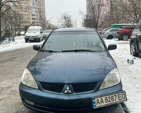 Синій Міцубісі Lancer, об'ємом двигуна 1.6 л та пробігом 249 тис. км за 4200 $, фото 1 на Automoto.ua