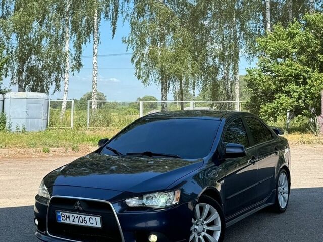 Синий Мицубиси Лансер, объемом двигателя 2 л и пробегом 250 тыс. км за 6300 $, фото 1 на Automoto.ua