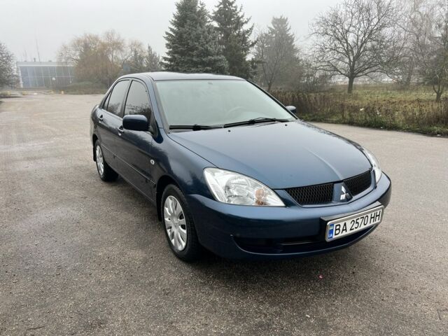 Синій Міцубісі Lancer, об'ємом двигуна 1.6 л та пробігом 126 тис. км за 5950 $, фото 1 на Automoto.ua