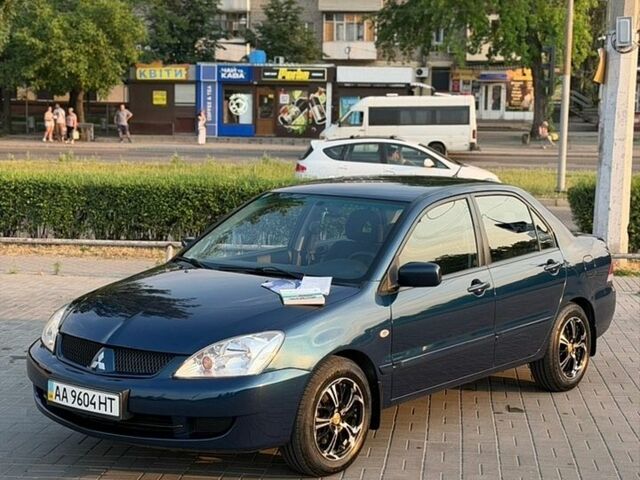 Синий Мицубиси Лансер, объемом двигателя 1.6 л и пробегом 160 тыс. км за 5900 $, фото 1 на Automoto.ua
