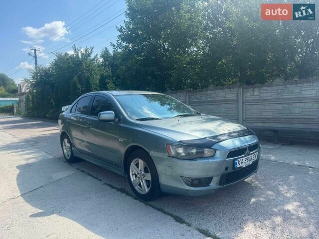 Синій Міцубісі Lancer, об'ємом двигуна 2 л та пробігом 150 тис. км за 4100 $, фото 1 на Automoto.ua