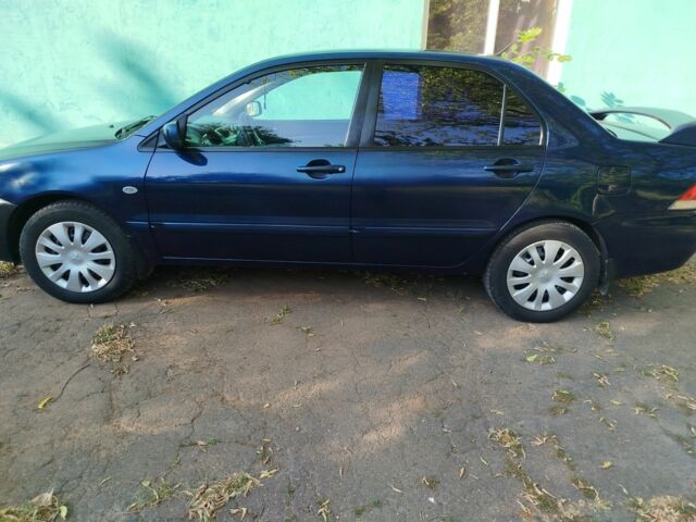 Мицубиси Лансер 2008 в Белой Церкве на Automoto.ua Синий Мицубиси Лансер, объемом двигателя 1.6 л и пробегом 243 тыс. км за 4200 $, фото 1 на Automoto.ua