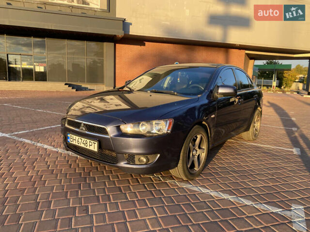 Синий Мицубиси Лансер, объемом двигателя 1.5 л и пробегом 247 тыс. км за 4500 $, фото 1 на Automoto.ua