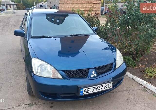 Синій Міцубісі Lancer, об'ємом двигуна 1.58 л та пробігом 220 тис. км за 4200 $, фото 1 на Automoto.ua