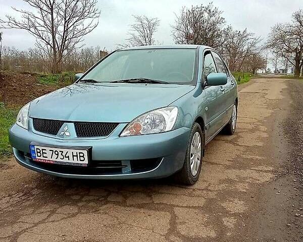 Синий Мицубиси Лансер, объемом двигателя 1.6 л и пробегом 167 тыс. км за 4700 $, фото 1 на Automoto.ua
