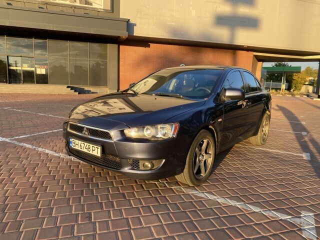 Синий Мицубиси Лансер, объемом двигателя 1.5 л и пробегом 247 тыс. км за 5000 $, фото 1 на Automoto.ua