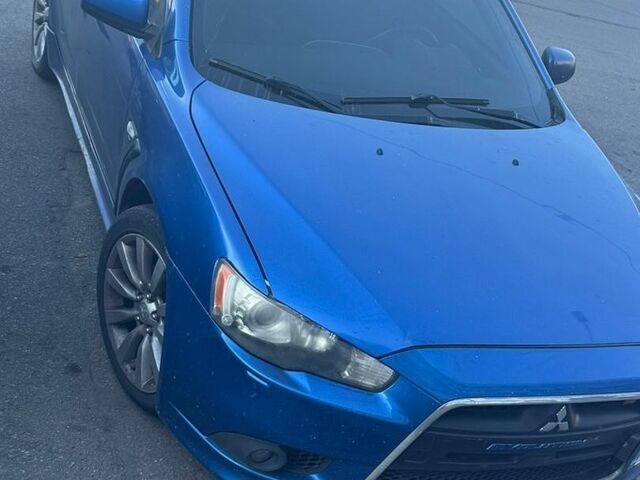 Синій Міцубісі Lancer, об'ємом двигуна 2 л та пробігом 300 тис. км за 8000 $, фото 1 на Automoto.ua