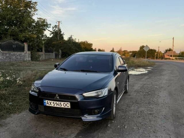 Синій Міцубісі Lancer, об'ємом двигуна 2 л та пробігом 300 тис. км за 5800 $, фото 1 на Automoto.ua