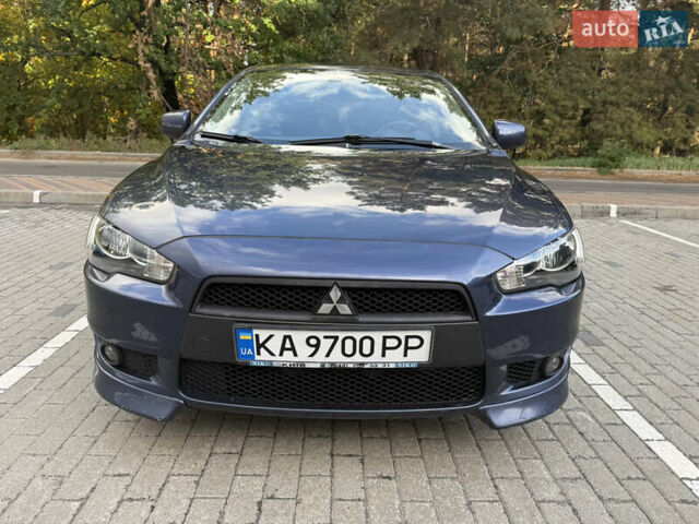 Синій Міцубісі Lancer, об'ємом двигуна 2 л та пробігом 201 тис. км за 8500 $, фото 1 на Automoto.ua