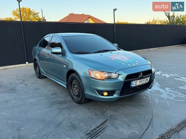 Синій Міцубісі Lancer, об'ємом двигуна 2 л та пробігом 144 тис. км за 6100 $, фото 1 на Automoto.ua
